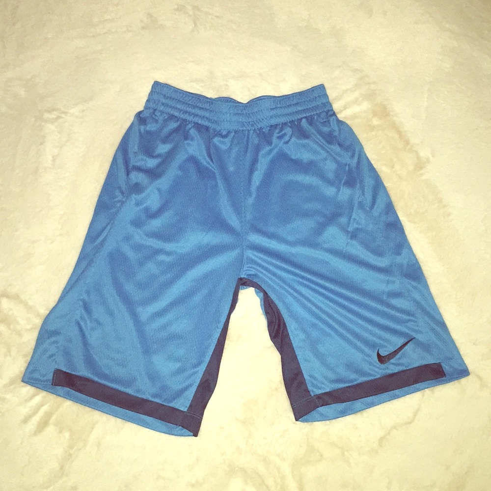 A large pair of Nike dry fit blue shorts